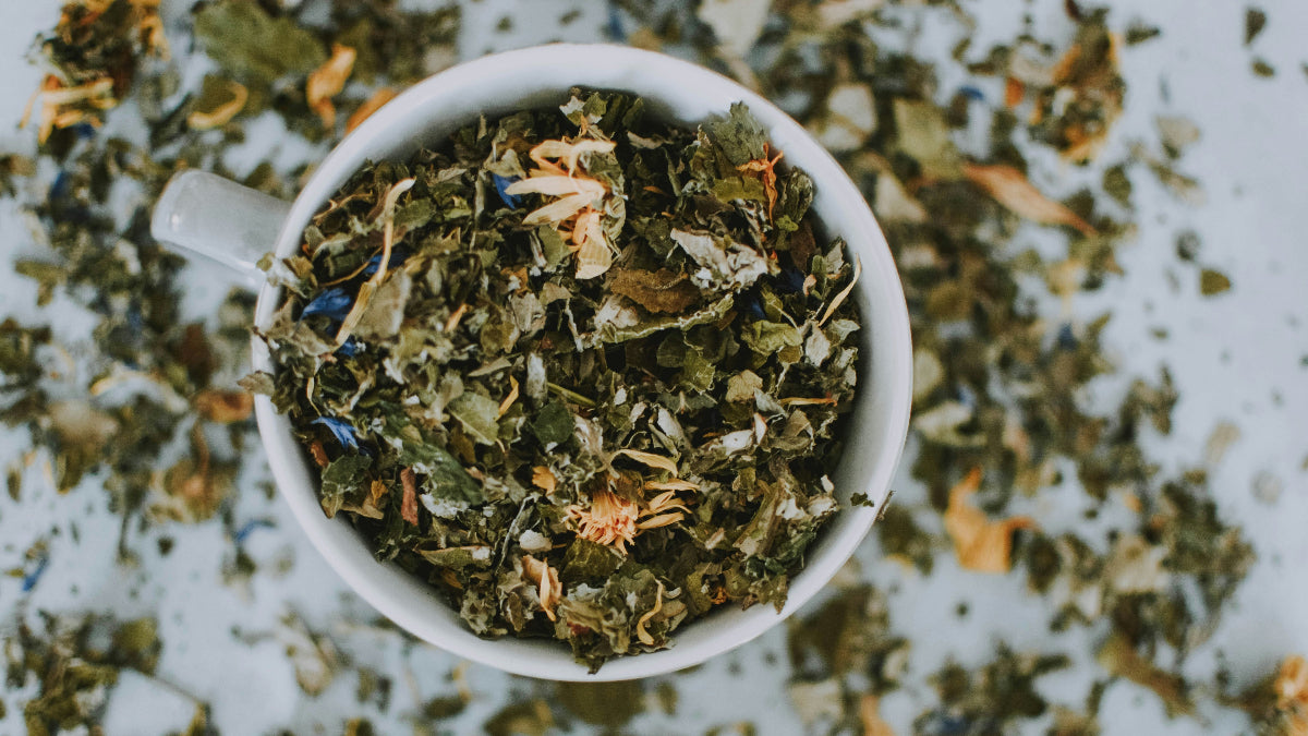 Loose-leaf herbal tea with dried flowers and herbs
