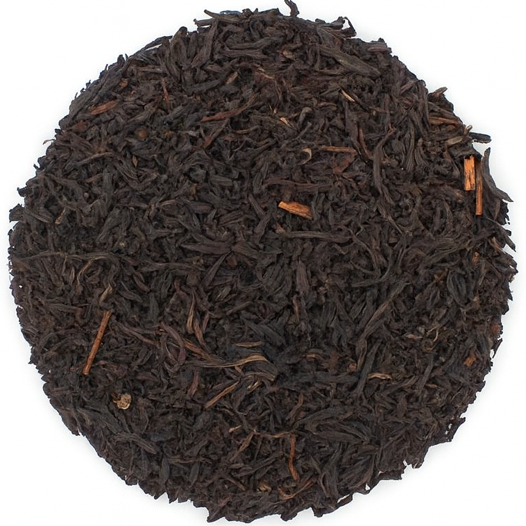 Black tea leaves on a white background