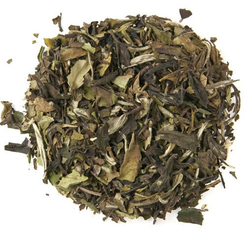 Loose leaf white tea with subtle floral and fruit notes