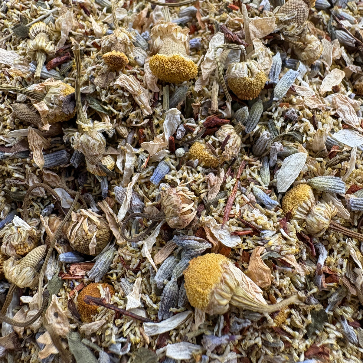 Tranquility herbal tea with chamomile, lavender, peppermint, and rooibos for relaxation and stress relief.