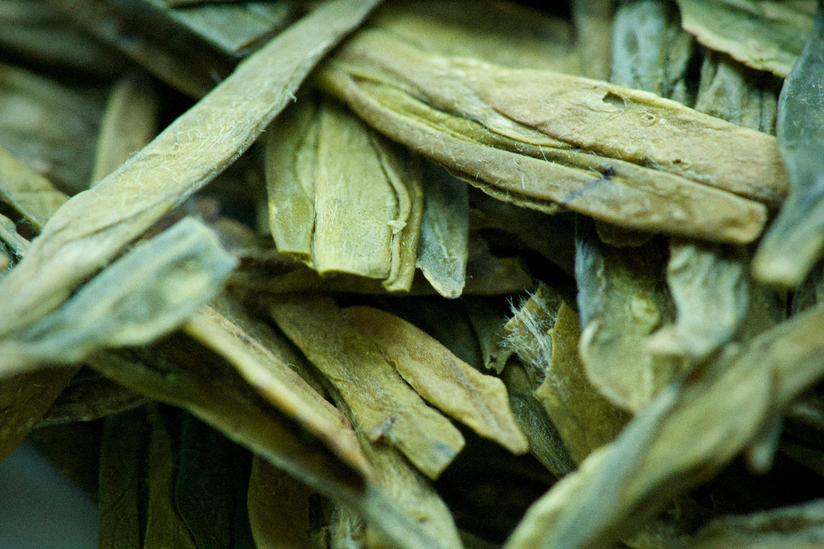 Close-up of dried green tea leaves