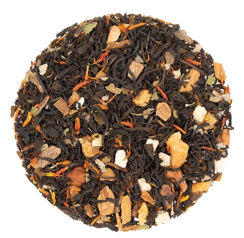 Teadaytea Apple Crisp premium loose-leaf black tea blend featuring dark black tea leaves with dried apple pieces, aromatic cinnamon bark, and vibrant orange safflower petals.