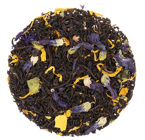 Teadaytea Hazelnut Vanilla premium loose-leaf black tea showing rich black tea leaves blended with vibrant yellow calendula and blue mallow petals.
