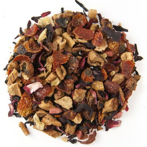 Teadaytea Strawberry Kiwi premium loose-leaf herbal tea blend featuring dried apple, strawberry, and kiwi pieces mixed with vibrant red hibiscus petals and rosehips.